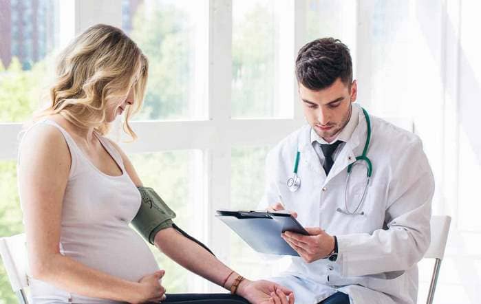 Пониженное давление болит голова беременность