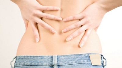 Болит внизу спины у девушек